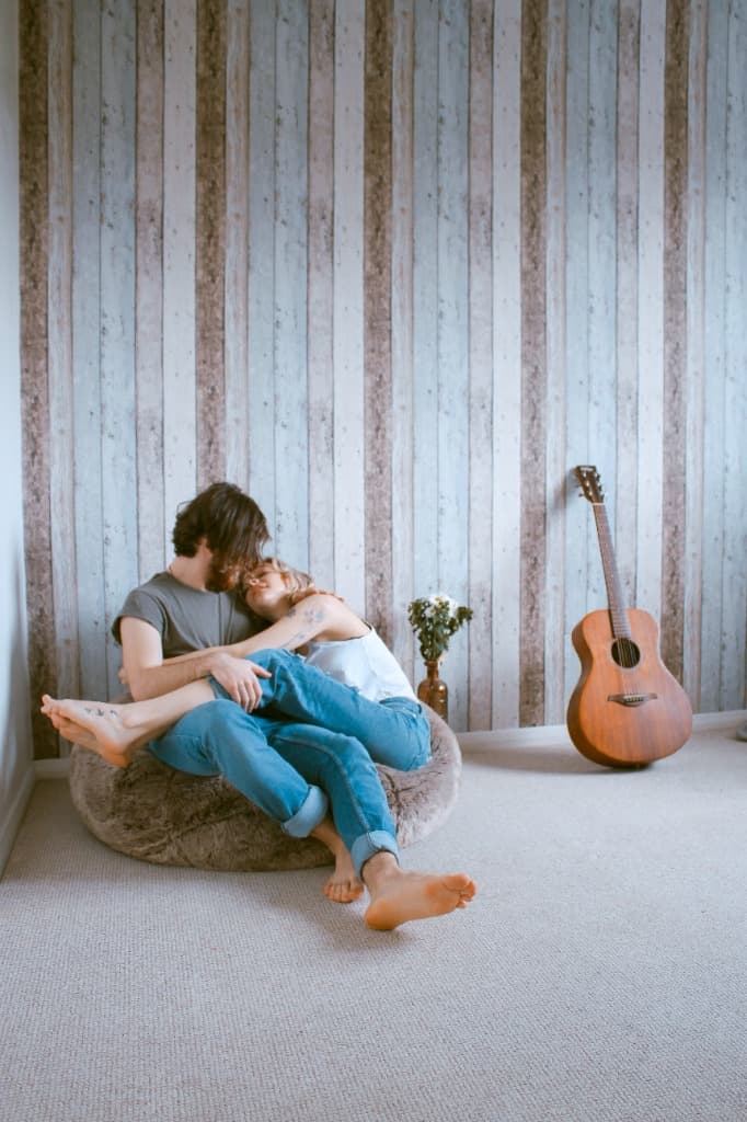 Couple playing guitar